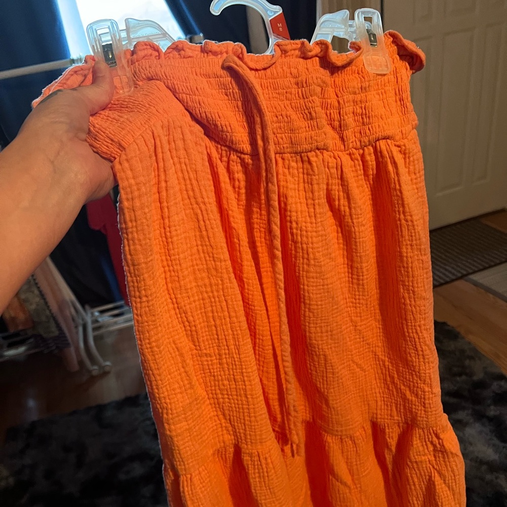 Quarter length peach dress tie in the front can wear around neck